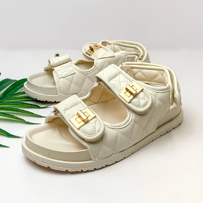 Women's Sandals with a Glitter - Coated Strap in Gold for a Sparkly Summer OutfitWeekend Trip Two Strap Velcro Sandals in Off White Women's Sandals with a Glitter - Coated Strap in Gold for a Sparkly Summer OutfitWeekend Trip Two Strap Velcro Sandals in Off White