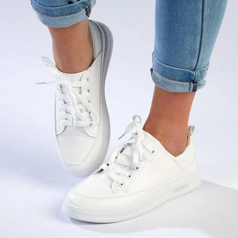 Women's Sneakers with Removable Insoles for Easy Cleaning and CustomizationSoft Style by Hush Puppies Tavi Sneaker - White Women's Sneakers with Removable Insoles for Easy Cleaning and CustomizationSoft Style by Hush Puppies Tavi Sneaker - White